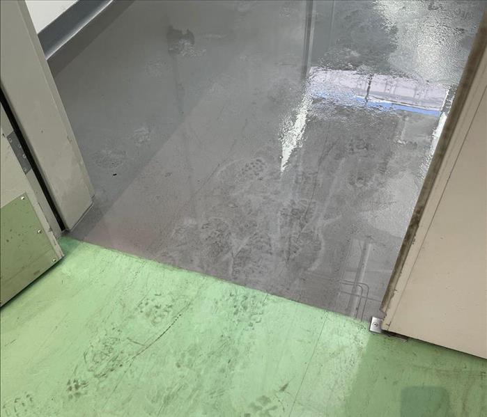 Flooding not only caused damage but create a dangerous work environment in the entryway