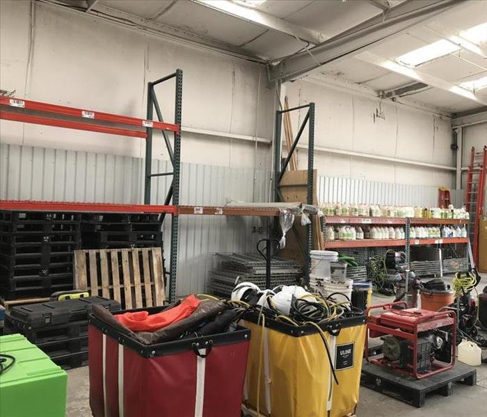 Organized equipment in a warehouse setting. 
