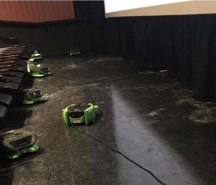 Photo of SERVPRO working to restore the theater like it never happened